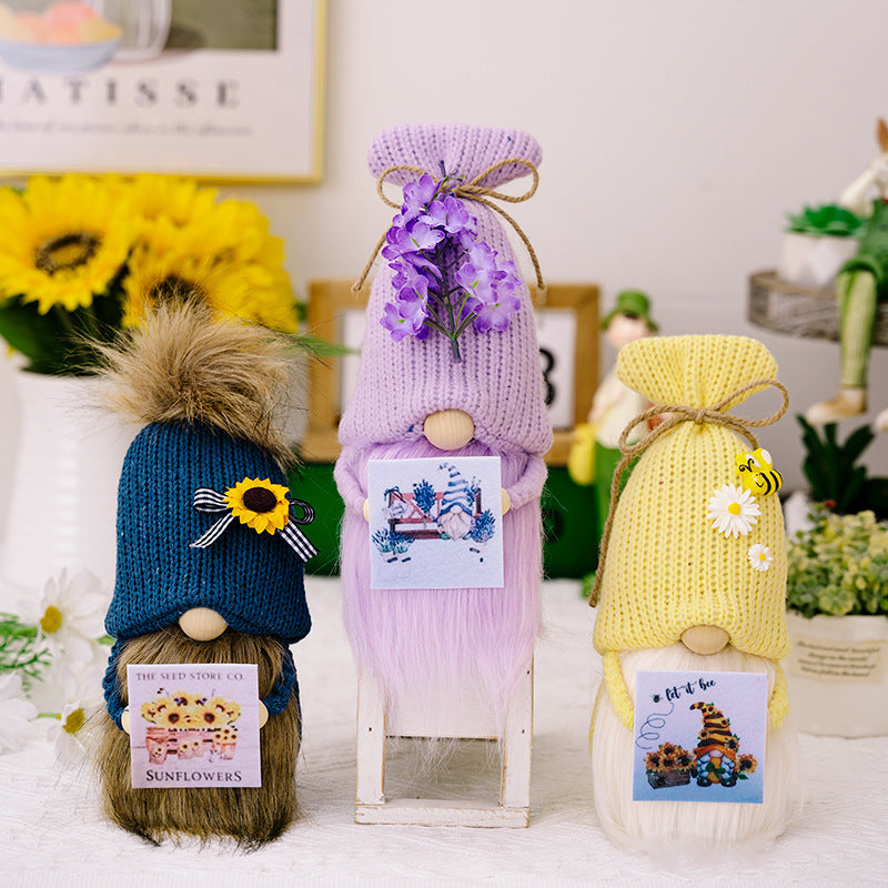 Knitted hat holding card flower gnomes