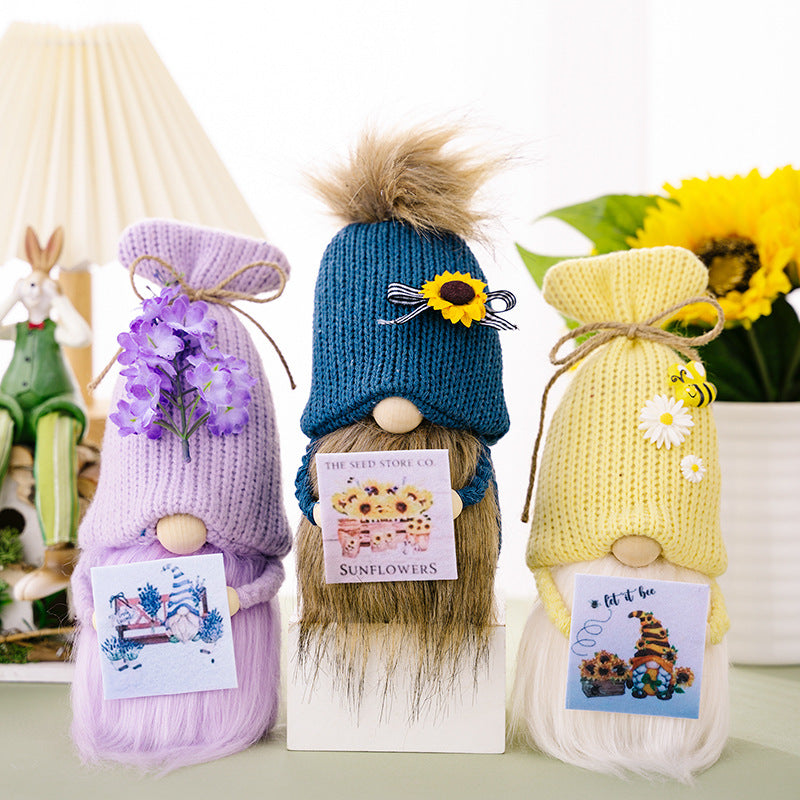 Knitted hat holding card flower gnomes